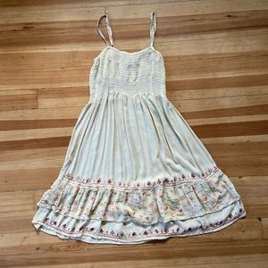 Cream Sun Dress with designed ruffled bottom